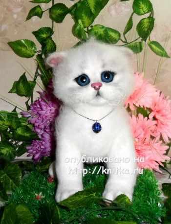 Вязаная спицами игрушка - работа Ирины