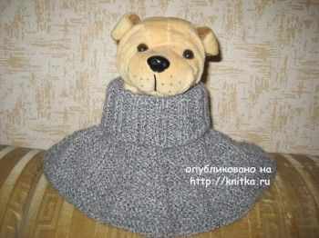 Вязаный спицами свитер